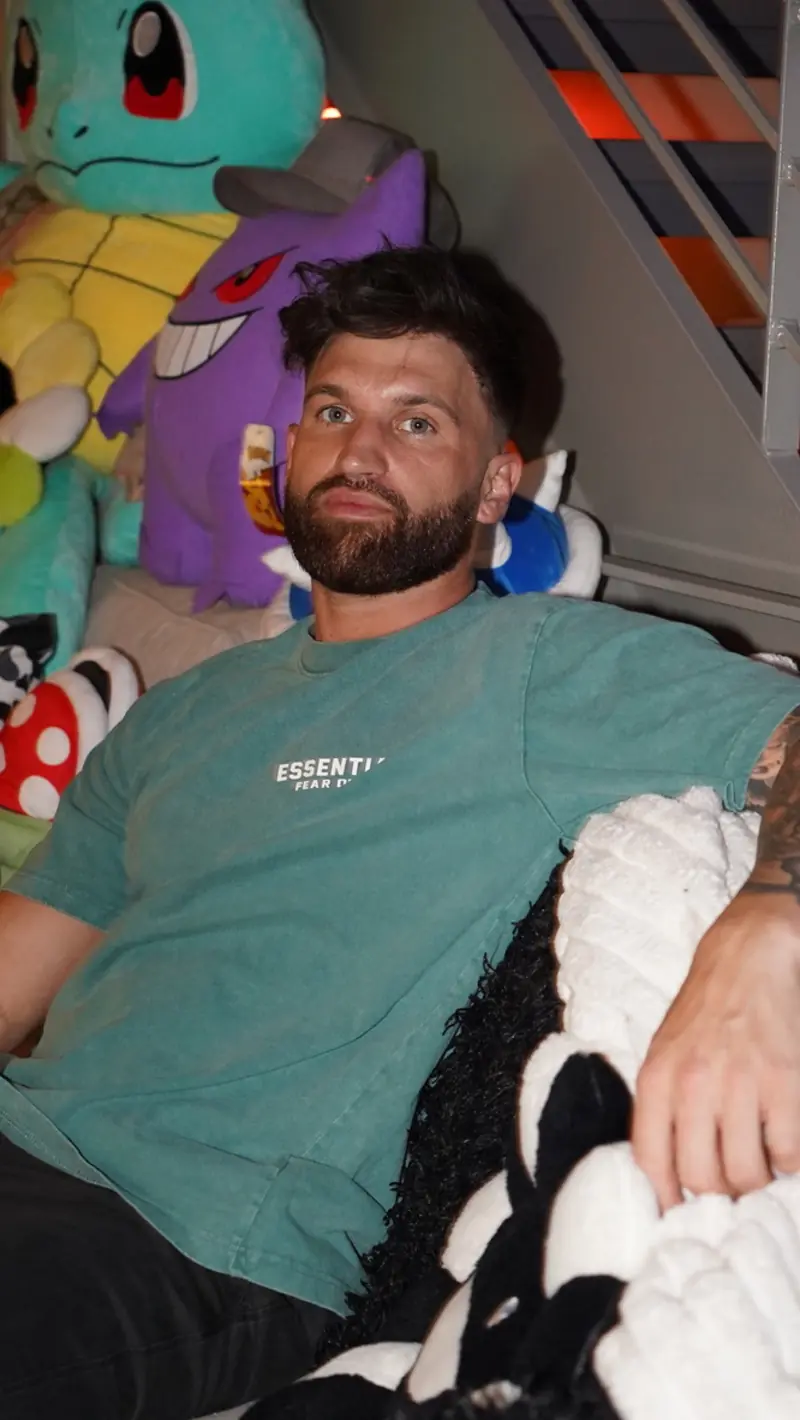 Caleb Hellinger relaxing at home